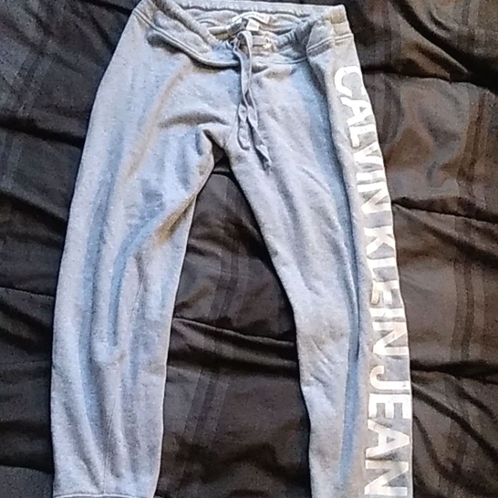 Calvin Klein Jeans, Size M. Color Gray
